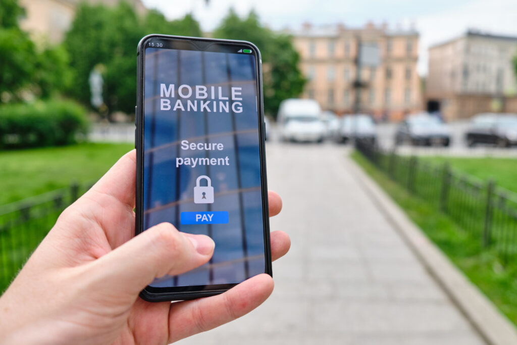mobile-banking-interface-with-secure-payment-function-smartphone-holding-by-hand